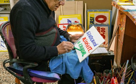 Is He the Last Man in Naples, Italy, to Paint Numbers By Hand?