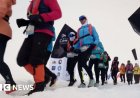 Marathon runners compete on drifting sea ice at North Pole