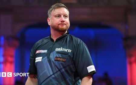 Menzies taken ill on stage at World Matchplay