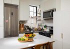 This Colander Doubles as a Storage Bin, and It’s Totally Transformed My Fridge